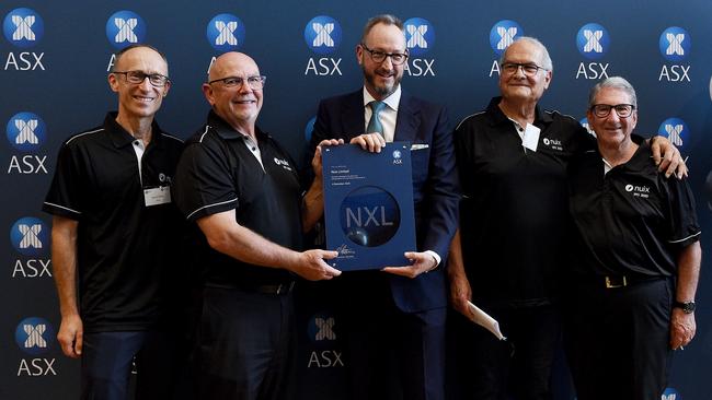 Rod Vawdrey, second from left, with other Nuix executives and directors at its listing ceremony last December. Picture: Bianca De Marchi