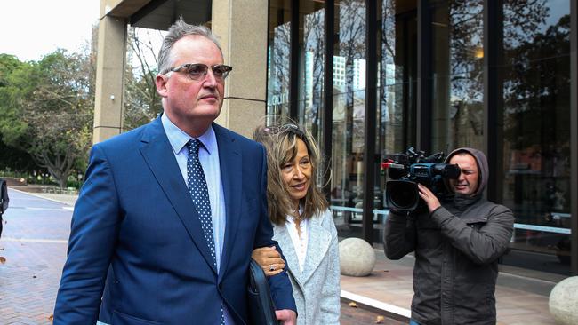 Hedley Thomas, left, leaves the Supreme Court in Sydney on Monday. Picture Gaye Gerard.