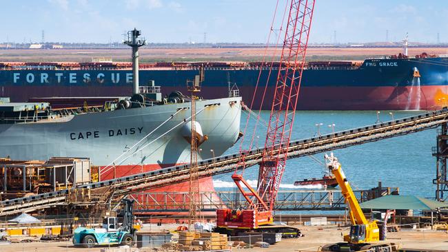 Bulk carriers sit docked at the port in Port Hedland.