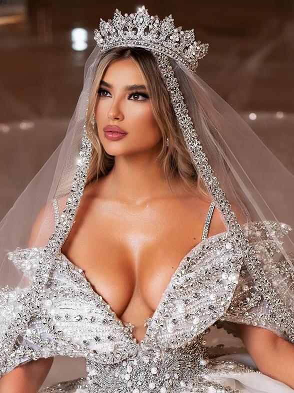 Many felt the bride was going to ‘pop out’ on her wedding day. Picture: Instagram/BliniFashionHouse