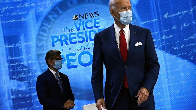 Democratic Presidential candidate and former US Vice President Joe Biden and moderator George Stephanopoulos arrive for an ABC News town hall event at the National Constitution Center in Philadelphia. Picture: Supplied