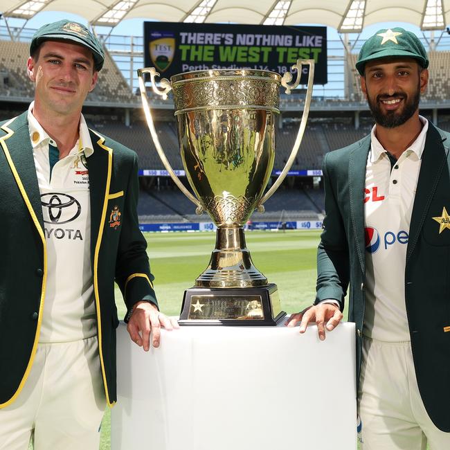 Pat Cummins and Shan Masood with the Benaud-Qadir Trophy. Picture: Paul Kane/Getty Images