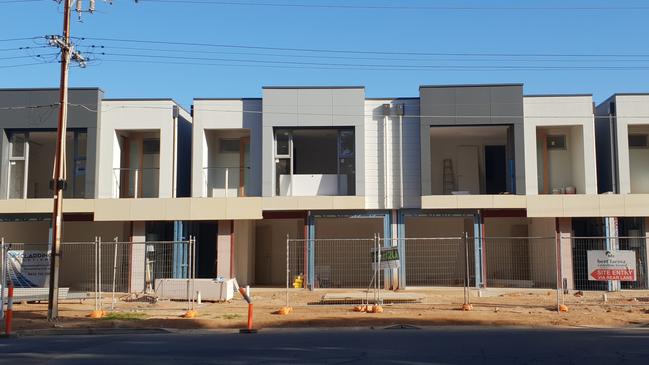 Row dwellings, similar to these built opposite the Paradise bus interchange, could be allowed in pockets of Adelaide under the planning reforms. Picture: COLIN JAMES