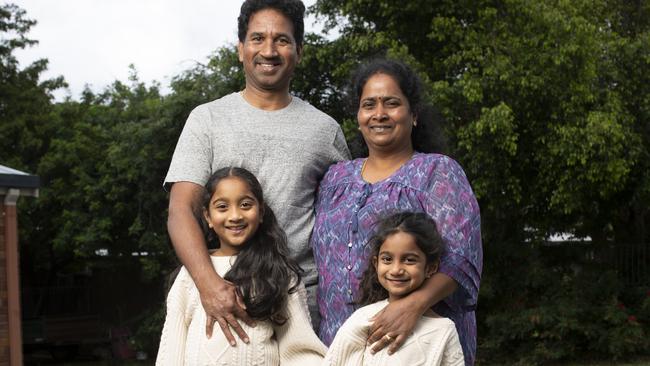 The Nadesalingam family – Nades and Priya with their daughters Kopika, 7, and Tharnicaa, 5 – at their home in Biloela, Queensland. Picture: Russell Shakespeare