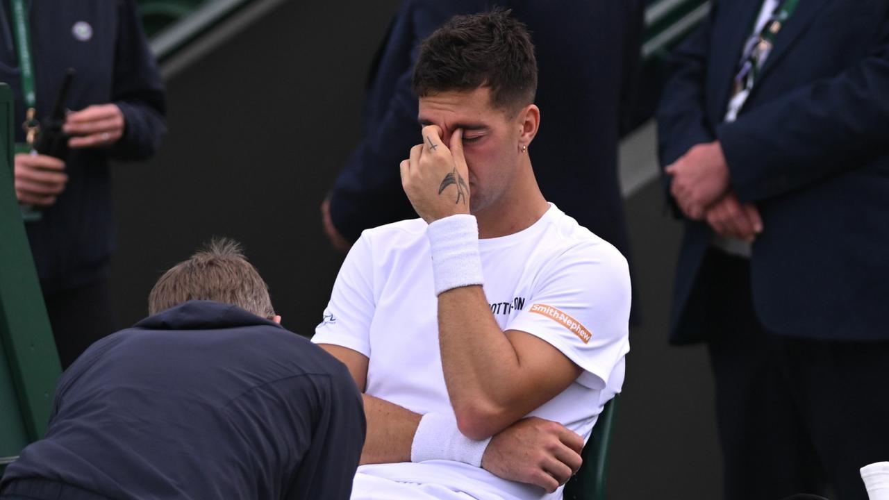 Thanasi Kokkinakis struck down in heartbreaking Wimbledon scenes