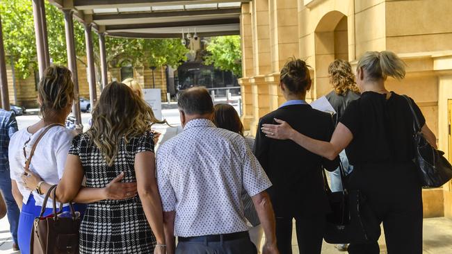 The teenage victim of Gorzechowski (second from right) leaves court with family after reading victim impact statements. Picture: Roy VanDerVegt