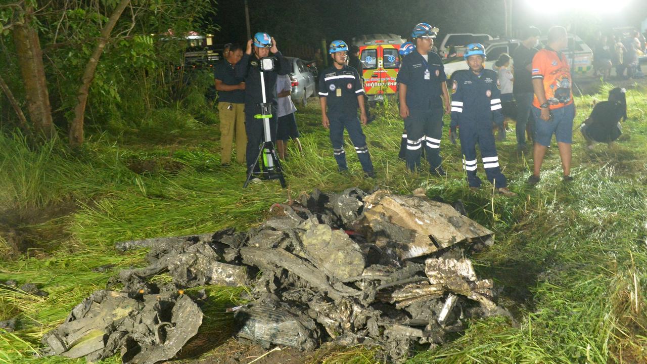 Rescuers work at the site of the crash in Chachoengsao province. Picture: Rachen Sageamsak/ Sun Weitong / Xinhua via AFP