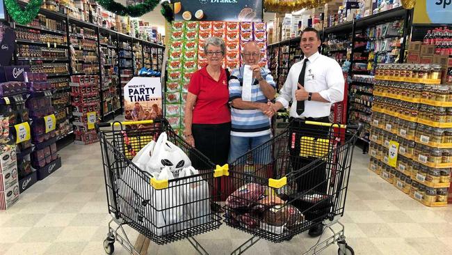 Alan Davies winner of the Great Grocery Grab competition at Drakes supermarket with manager Scott Perel. Picture: contributed