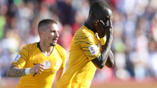 Awer Mabil displays his “Awareness of Mind” goal celebration after scoring against Palestine last week. Picture: Getty Images