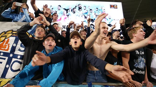 Sydney FC fans celebrate after winning the 2017 A-League Grand Final.