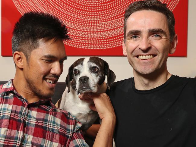 Pictured at their home in Redfern is Jerry Gobel and Hugh McGonagle who adopted their dog Ellie five weeks ago.Ellie came from a testing facility in New South Wales and was in foster care for a few weeks in Sydney prior to being adopted by Hugh and Jerry.Picture: Richard Dobson