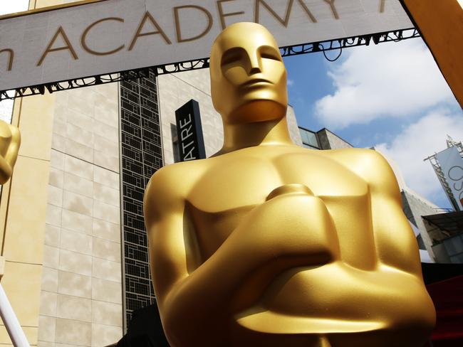 FILE - In this Feb. 21, 2015 file photo, an Oscar statue appears outside the Dolby Theatre for the 87th Academy Awards in Los Angeles. The largest black audience for the Academy Awards over the last dozen years came in 2005, when Chris Rock was host and Jamie Foxx and Morgan Freeman won the top male acting awards. Rock will be back as host this year, but it's an open question how many African American viewers will be tuning in. A lack of diversity in Oscar nominations have led to stars like Spike Lee and Jada Pinkett Smith calling for a boycott of the Academy Awards, scheduled for Feb. 28. (Photo by Matt Sayles/Invision/AP, File)