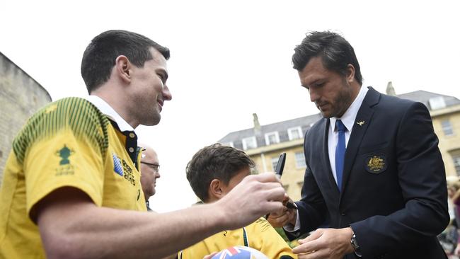 Australia's winger Adam Ashley-Cooper greets fans on arrival at the Assembly Rooms in Bath on September 15, 2015, to attend their official welcoming ceremony, three days before the opening match of the Rugby World Cup 2015 between England and Fiji at Twickenham stadium. AFP PHOTO / MARTIN BUREAU