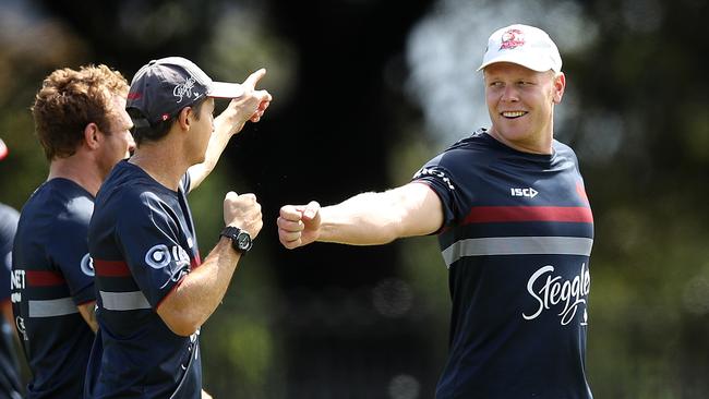 Roosters trainers Drew Hutchison and Jason Taylor bring out the knuckles.