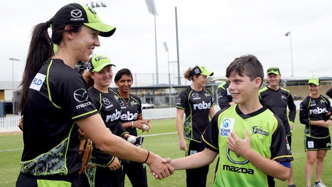 Riley Brunsden meets the Sydney Thunder players at Blacktown International Sportspark. Picture: Craig Wilson