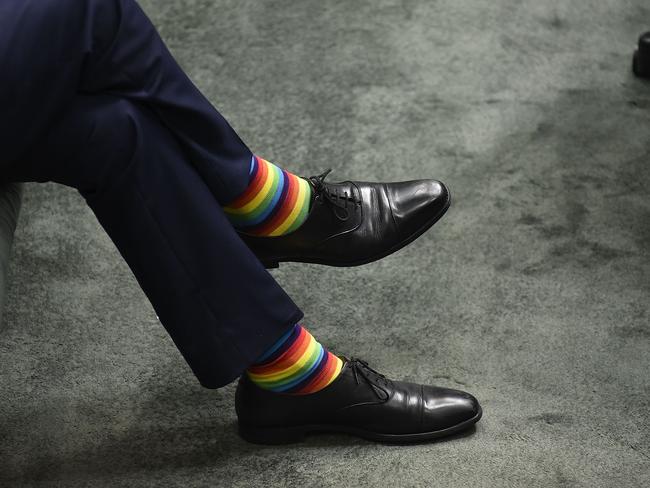 Mark Dreyfus shows support for the marriage equality bill by wearing colourful socks at Parliament House on December 7. Picture: Michael Masters/Getty Images