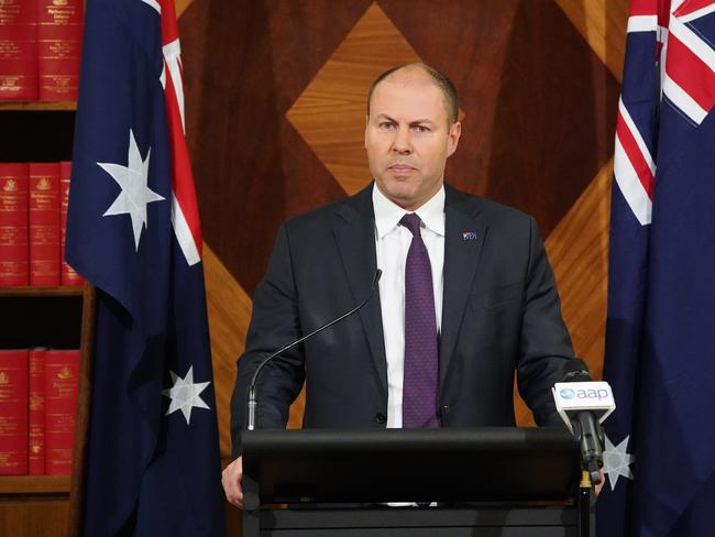 Federal Treasurer Josh Frydenberg speaks to the media during a press conference in Melbourne, Tuesday, June 4, 2019. The Treasurer is calling on all banks to pass on the full interest rate cut handed down by the RBA. (AAP Image/Stefan Postles) NO ARCHIVING