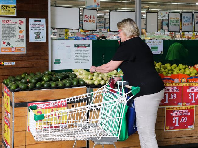 SYDNEY, AUSTRALIA -  Newswire Photos MARCH 14 2023 - A member of the public is seen buying produce and groceries in Sydney as the Cost of living continues to rise. Picture: NCA Newswire / Gaye Gerard.