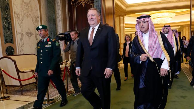 (FILES) In this file photo taken on October 16, 2018 US Secretary of State Mike Pompeo (L) walks alongside Saudi Foreign Minister Adel al-Jubeir in Riyadh. - Saudi Arabia's Foreign Minister Adel al-Jubeir said October 21, 2018 the kingdom did not know where the body of slain journalist Jamal Khashoggi was, despite admitting to the killing and calling it a "tremendous mistake." Speaking in an interview on Fox News, Jubeir said the Saudi leadership initially believed Khashoggi had left its diplomatic mission in Istanbul, where he was last seen on October 2. (Photo by LEAH MILLIS / POOL / AFP)