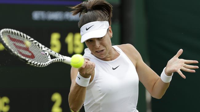 Australia's Ajla Tomljanovic hits a forehand return to Victoria Azarenka in the second round match at Wimbledon. Picture: AP