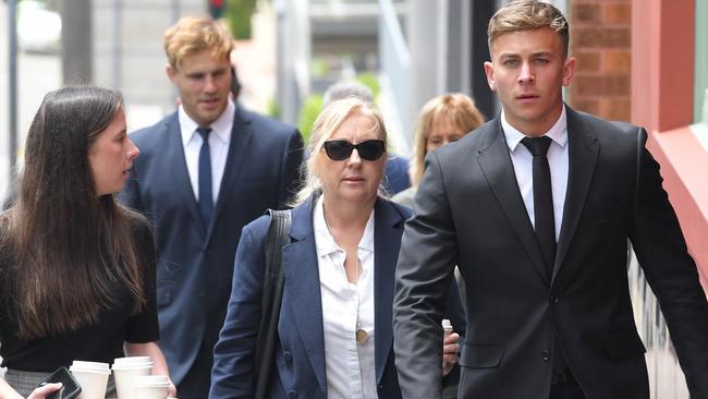 Callan Sinclair and Jack De Belin with supporters. Picture: NCA NewsWire / Simon Bullard.