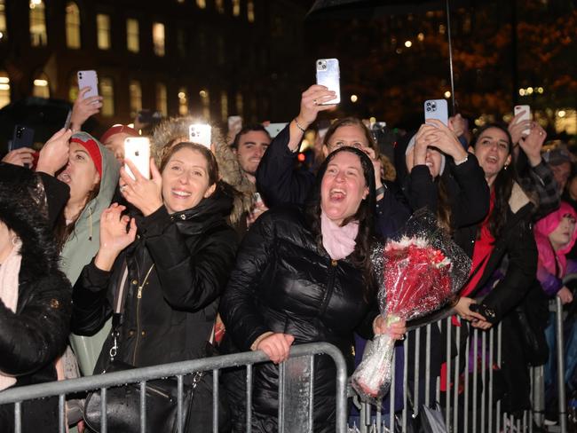 Crowds of people cheer and took pictures of the royal couple as they arrived for the event in City Hall Plaza in Boston. Picture: Getty Images.