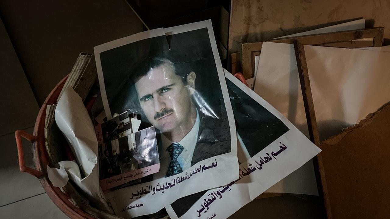 Posters and framed portraits of Bashar al-Assad are seen in the bin at the Ministry Of Information building in Damascus, Syria. Picture: McGrath/Getty Images