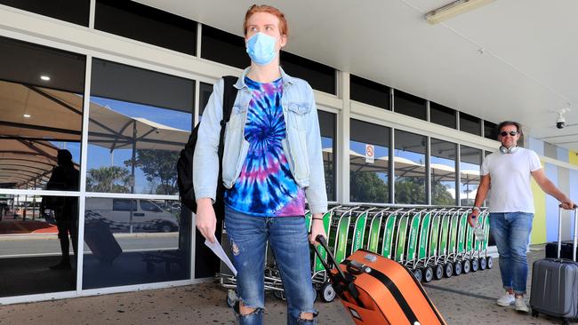 Tremayne Spencer from Sydney arrives on the last flights out of Sydney before a hard lock down commences. Photo: Scott Powick Newscorp