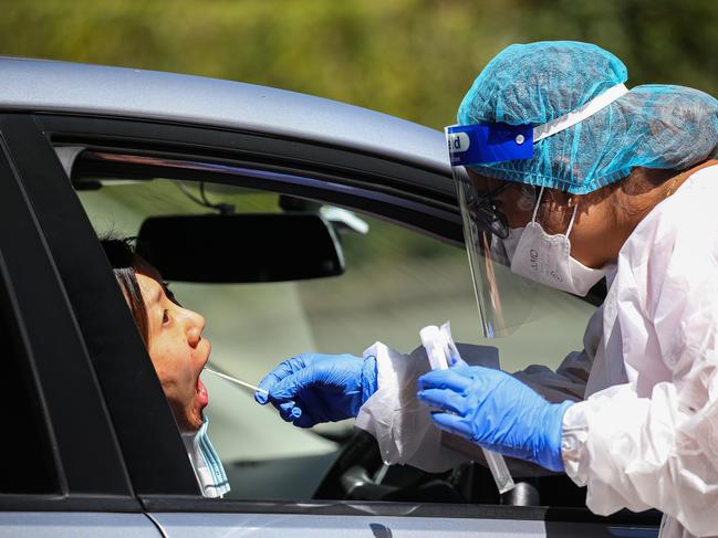 A nurse conducts a Covid-19 test in Sydney. Picture: NCA NewsWire / Gaye Gerard