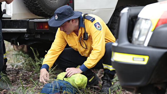 An RFS member preparing at Mt Wilson RFS HQ in Mt Wilson to continue the search for Charlise Mutten. Picture: Adam Yip