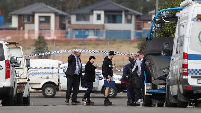 Police in Langton St Riverstone where a 39-year-old man was murdered in an alleged home invasion. Picture: David Swift.