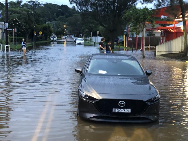 A car in Gondola Rd, North Narrabeen at 7.30pm on Tuesday. Picture: Jim O'Rourke