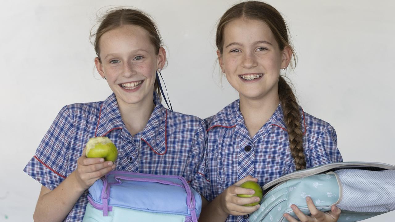 Calvary Lutheran Primary School’s Eadie, 10, and Anita, 10, enjoy a healthy packed lunch. Picture: Brett Hartwig