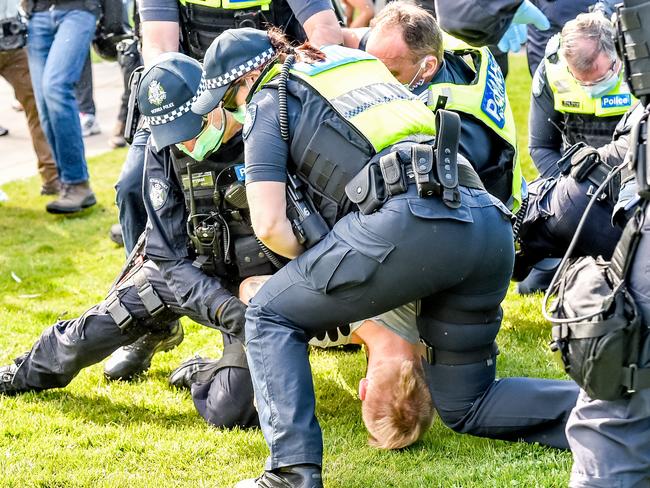 Freedom Day protest - Shrine of Remembrance. Anti Covid-19 / lockdown protesters rally at the Shrine of Remembrance. Protesters are restrained after an altercation with police. Picture: Jake Nowakowski