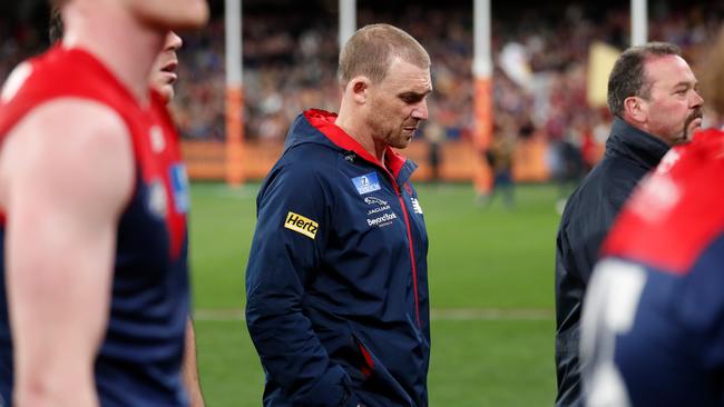 MELBOURNE, AUSTRALIA - SEPTEMBER 09: Simon Goodwin, Senior Coach of the Demons looks dejected after a loss during the 2022 AFL Second Semi Final match between the Melbourne Demons and the Brisbane Lions at the Melbourne Cricket Ground on September 9, 2022 in Melbourne, Australia. (Photo by Michael Willson/AFL Photos via Getty Images)