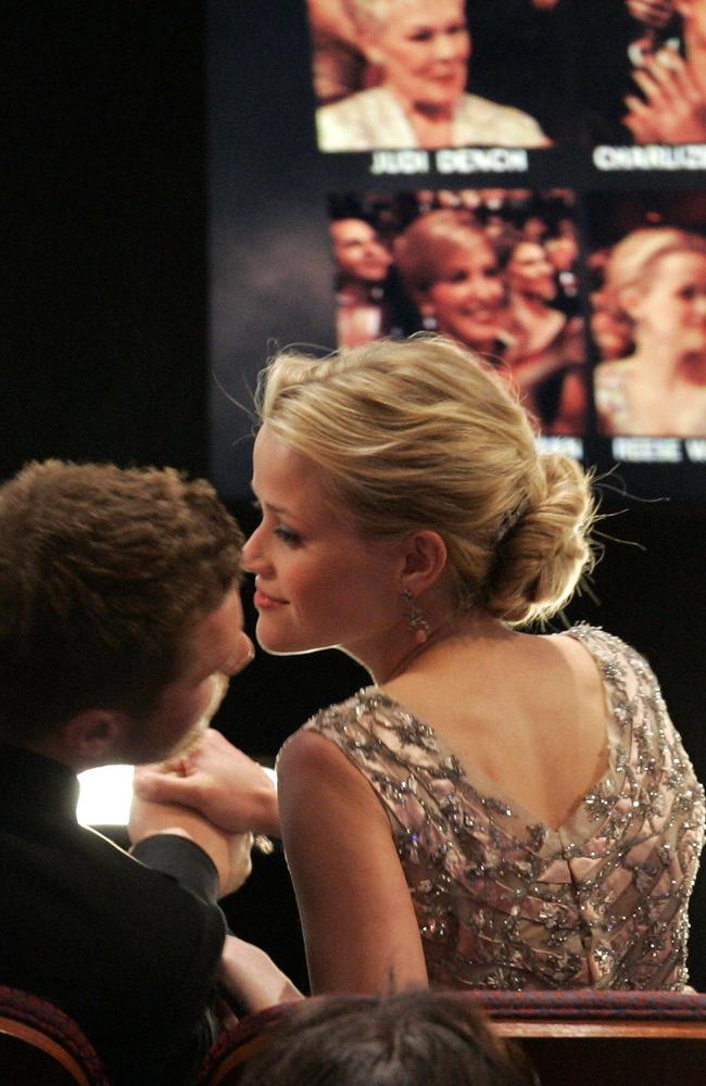 Reese Witherspoon reacts with her ex-husband Ryan Phillippe as she wins the Oscar for best actress for her work in film Walk the Line. Picture: AP