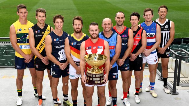 SANFL captains (from left) Luke Thompson (Eagles), Chris Curran (Glenelg), Matt Rose (South Adelaide), Matthew Wright (Adelaide), Max Thring (North Adelaide), Zane Kirkwood (Sturt), Jace Bode (Norwood), Hugh Haysman (West Adelaide, standing in for Tom Keough), Trent Goodrem (Central District) and Cam Sutcliffe (Port Adelaide). Picture: Mark Brake/AAP