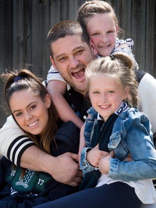 Brendan Fevola with his girls, Mia, 17, Lulu, 7, and Leni, 10. Picture: Jay Town