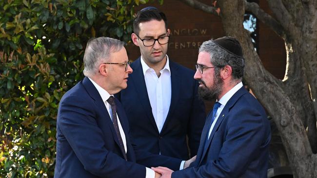 Anthony Albanese, left, and Labor’s Macnamara MP Josh Burns are greeted by Rabbi Yaakov Glasman during a visit to the St Kilda Shule in Melbourne, four days after Hamas’ attack on Israel in October. Picture: AAP