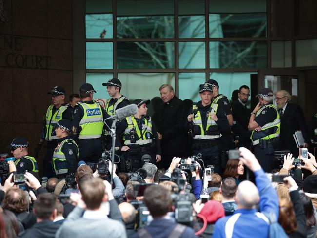 Cardinal Pell leaves court after the brief hearing. AAP Image/Stefan Postles