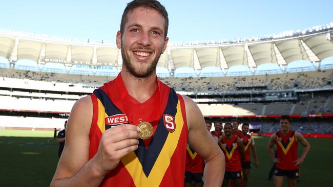 Michael Knoll of the SANFL poses with the Fos Williams medal for best player against WA. Picture: Paul Kane/Getty Images