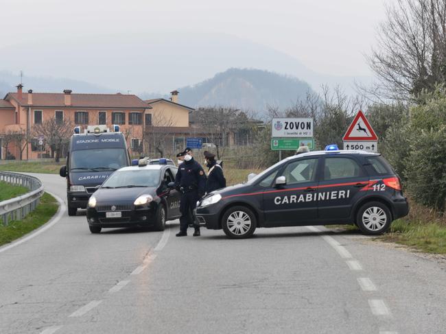 Carabinieri block the road in Zovon near Venice amid fears over the spread of COVID-19. Picture: AFP