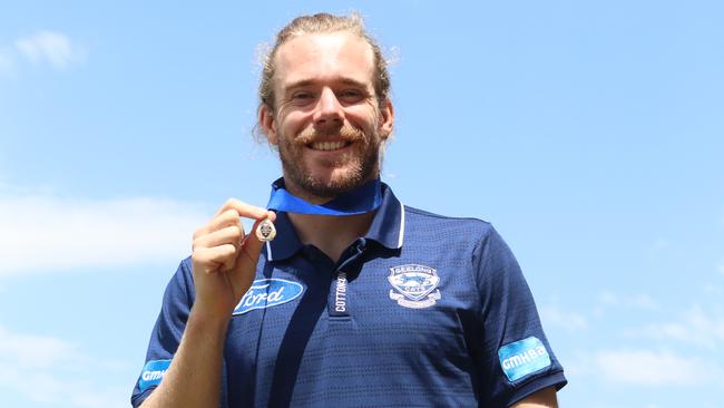 Cam Guthrie with the Carji Greeves Medal.