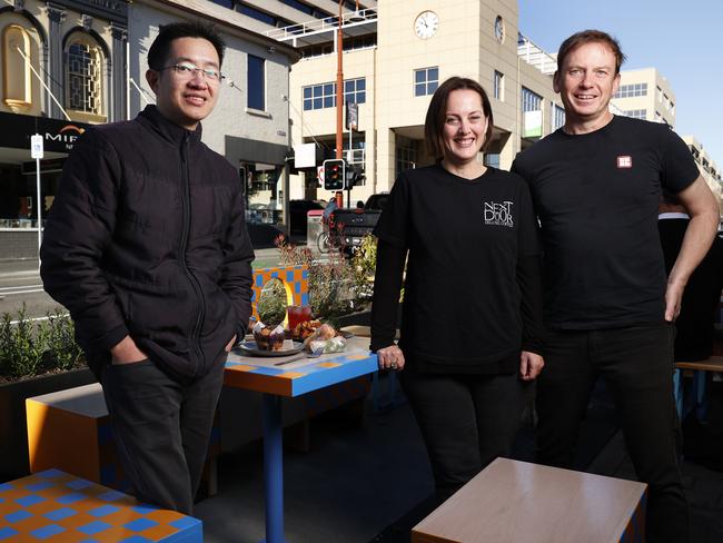 Ho Nguyen of UnPhogettable, Lisa Monro (Monro) of Next Door Coffee, David Painter of Sush with one of the new outdoor dining areas installed in Collins Street.  Launch of Transforming Collins Street by City of Hobart.  Picture: Nikki Davis-Jones