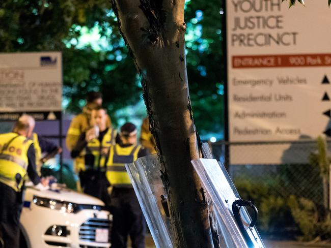 Police riot shields at the scene at the entrance to the centre after TEENAGER prisoners are rioting tonight in an inner city youth centre.The youths were reportedly on the roof of the Melbourne Youth Justice Centre in Parkville.One prison insider told the Herald Sun up to thirty youths were without beds tonight as they had badly ÒtrashedÓ their cellson Saturday 12th November, 2016. Picture: Mark Dadswell