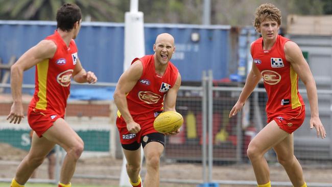 Michael Rischitelli, Gary Ablett and Daniel Gorringe at Gold Coast training in 2011.