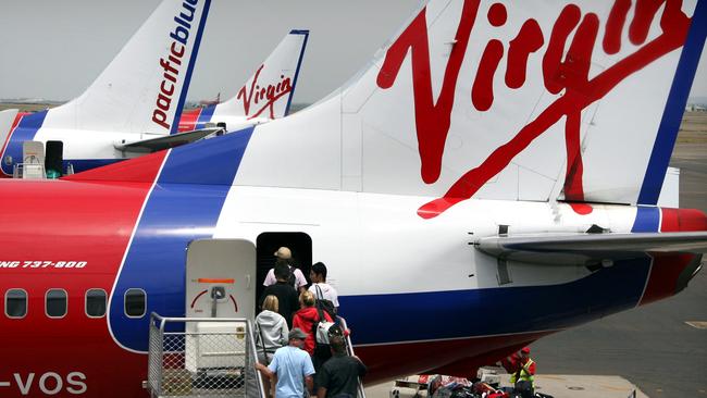 Passengers boarding a Virgin Australia plane.