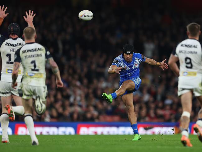 Stephen Crichton slots the winning field goal. Picture: Matthew Lewis/Getty Images for RLWC