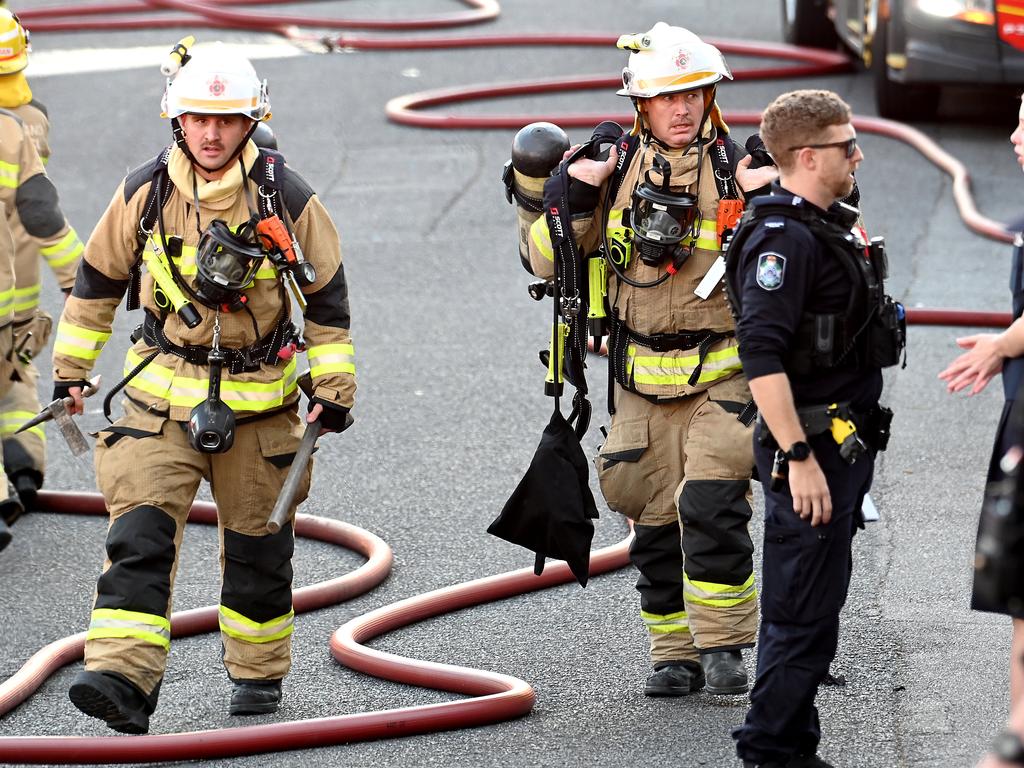 Firefighters at a house fire in Amelia street, Albion which burst into flames on Thursday afternoon. Picture: John Gass