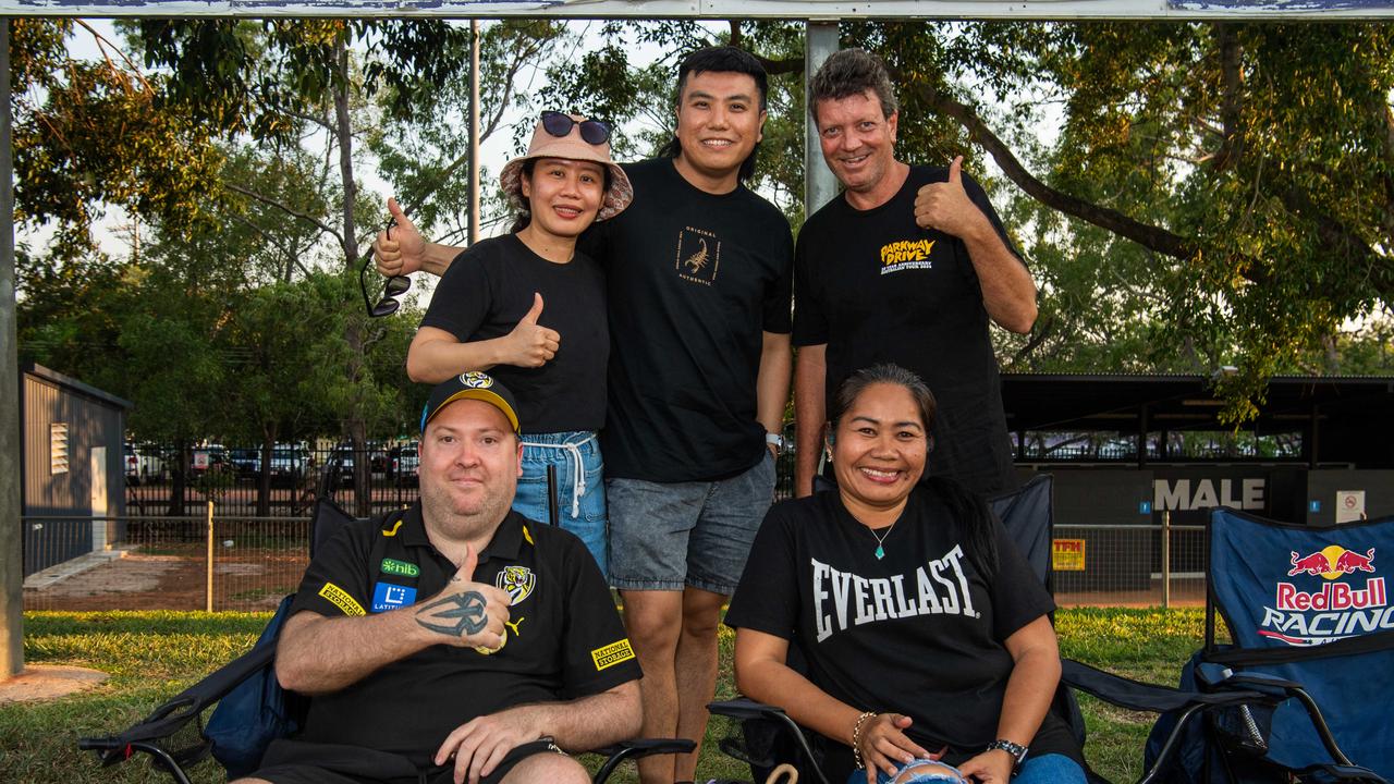 Yen Karuniawati, Chris Liemanto, Mark Gamble, Jamie Parker and Shalimar Salle as thousands of fans gathered for the AFLW Dreamtime game between Richmond and Essendon in Darwin. Picture: Pema Tamang Pakhrin